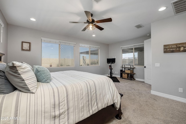 carpeted bedroom with ceiling fan