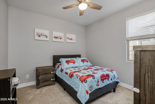 bedroom featuring ceiling fan and light colored carpet