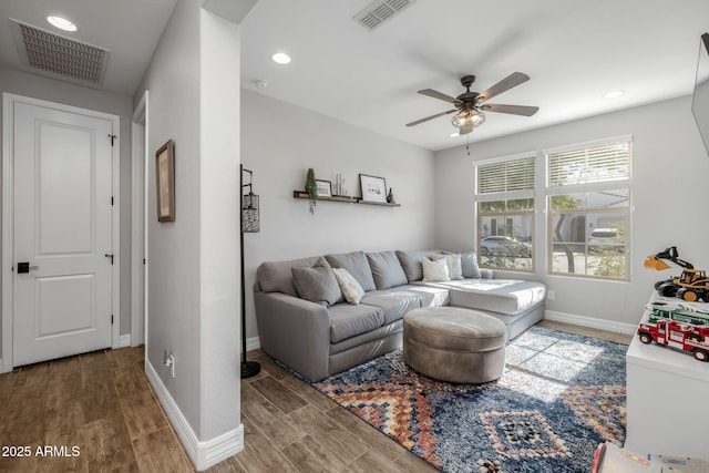 living room with ceiling fan