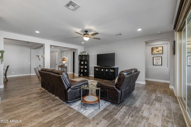 living room featuring ceiling fan