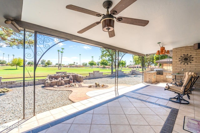 view of patio / terrace featuring ceiling fan and a grill