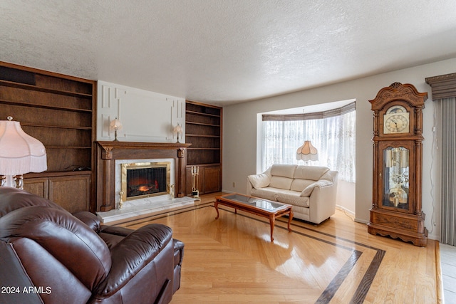 living room with a textured ceiling