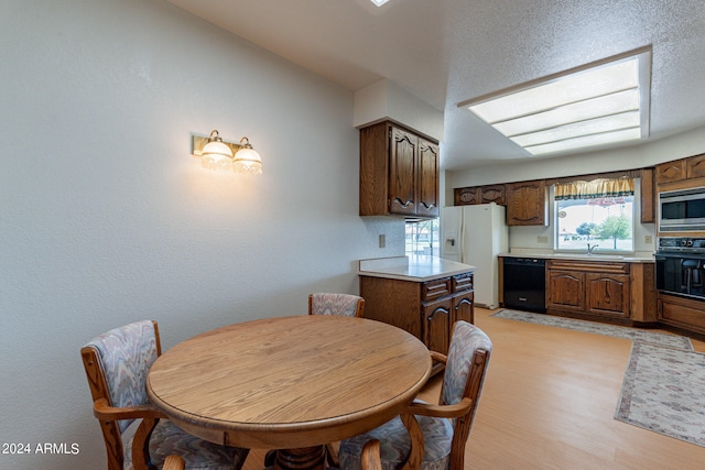 dining space featuring light hardwood / wood-style flooring