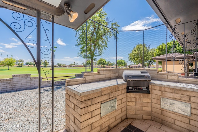 view of patio with area for grilling