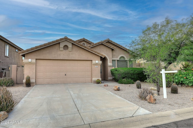 single story home with a garage