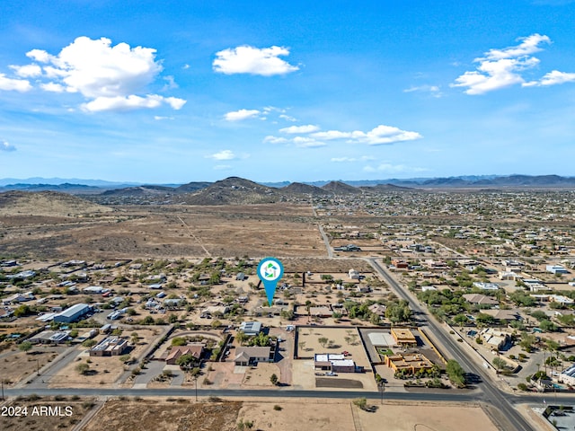 drone / aerial view featuring a mountain view