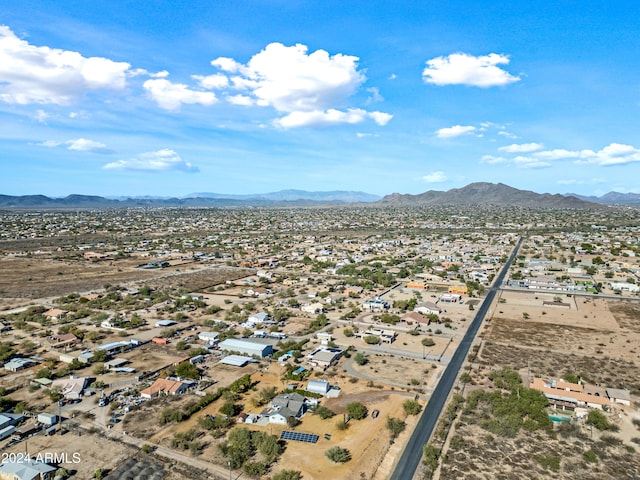 birds eye view of property featuring a mountain view