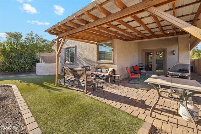 view of patio / terrace featuring an outdoor living space, french doors, and fence