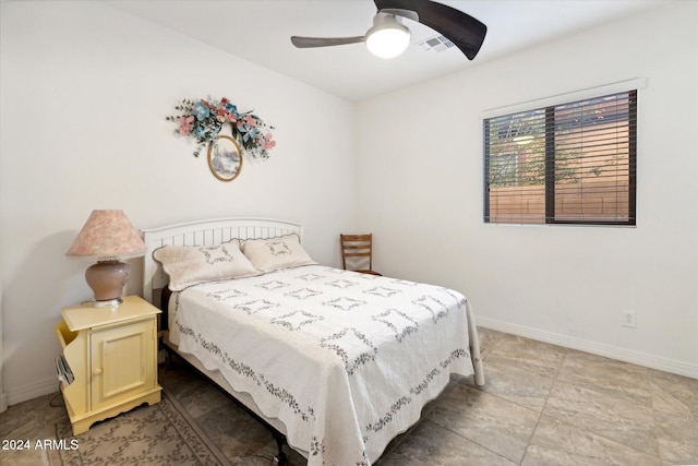 bedroom featuring baseboards, visible vents, and ceiling fan