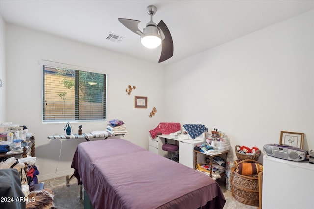 bedroom with visible vents, baseboards, and a ceiling fan