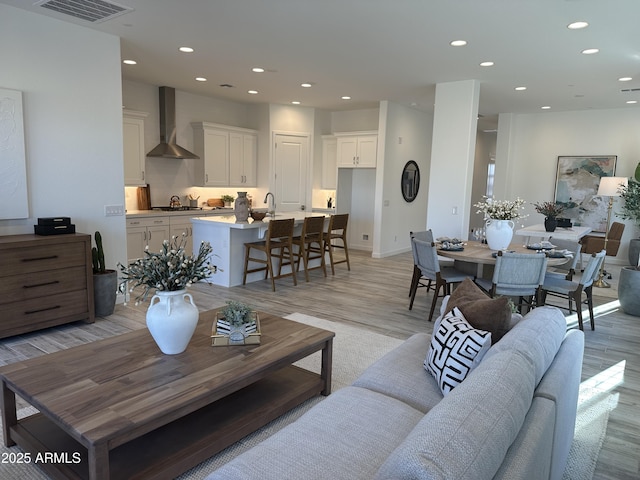 living room featuring light wood-type flooring