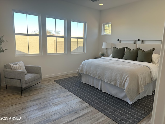 bedroom featuring light wood-type flooring