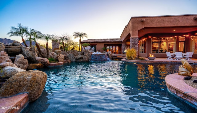 pool with a patio area