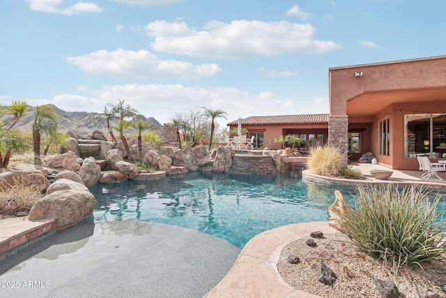 pool featuring a patio area