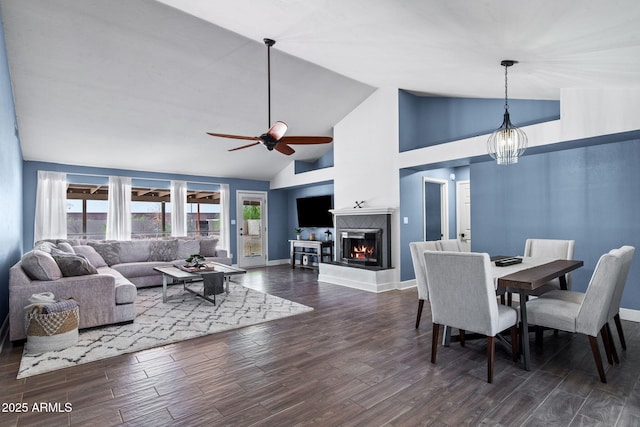 5841 W Kesler St, Chandler, AZ 85226 - dining area featuring dark wood-style flooring, a fireplace, high vaulted ceiling, a ceiling fan, and baseboards