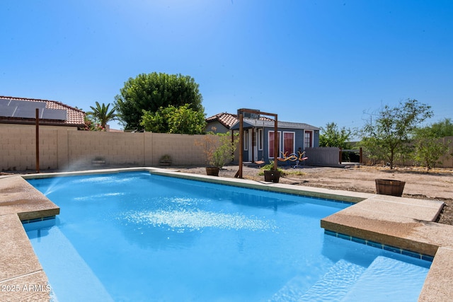 5841 W Kesler St, Chandler, AZ 85226 - view of swimming pool with an outbuilding and a fenced backyard
