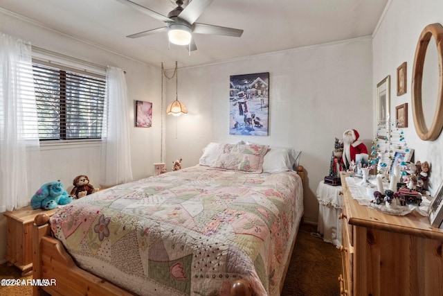 bedroom with ceiling fan and carpet flooring