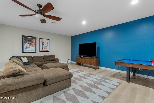 living room featuring ceiling fan, recessed lighting, wood finished floors, visible vents, and baseboards