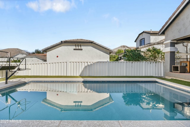 view of pool with a fenced backyard and a fenced in pool