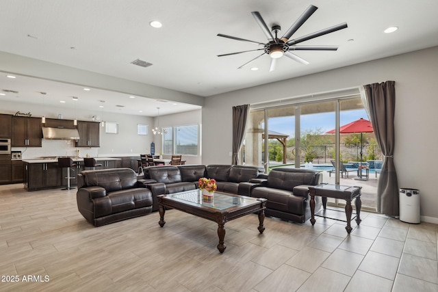 31490 N 126th Ln, Peoria, AZ 85383 - living area featuring recessed lighting, visible vents, and ceiling fan