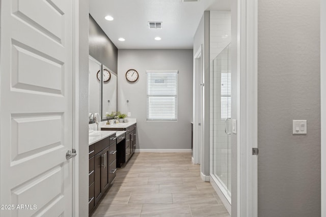 31490 N 126th Ln, Peoria, AZ 85383 - full bath with a shower stall, visible vents, recessed lighting, double vanity, and baseboards
