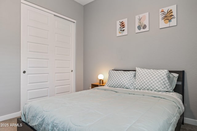 31490 N 126th Ln, Peoria, AZ 85383 - carpeted bedroom featuring a closet and baseboards