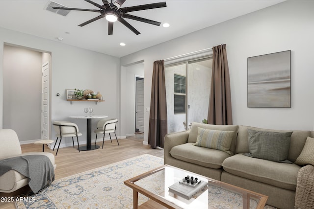 31490 N 126th Ln, Peoria, AZ 85383 - living area featuring recessed lighting, light wood finished floors, baseboards, and a ceiling fan