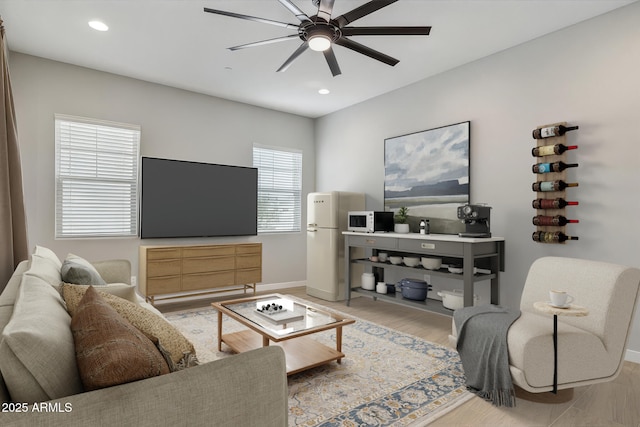 31490 N 126th Ln, Peoria, AZ 85383 - living room with wood finished floors, ceiling fan, baseboards, and recessed lighting
