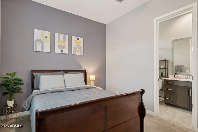 31490 N 126th Ln, Peoria, AZ 85383 - bedroom featuring light carpet, ensuite bathroom, and baseboards