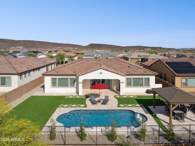 31490 N 126th Ln, Peoria, AZ 85383 - exterior space featuring a fenced in pool, a patio area, a fenced backyard, and a lawn