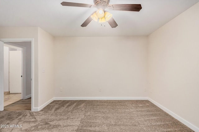 unfurnished room with carpet, baseboards, and ceiling fan