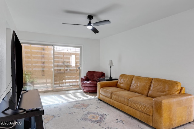 living area featuring ceiling fan