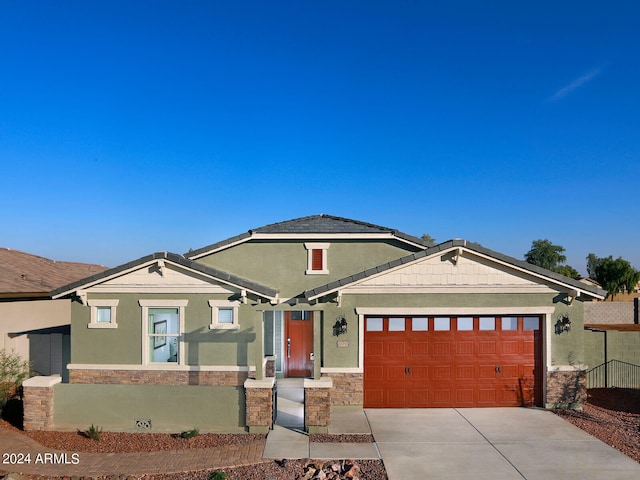 view of front of home featuring a garage