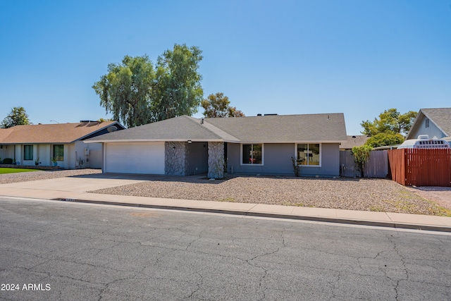 ranch-style house with a garage