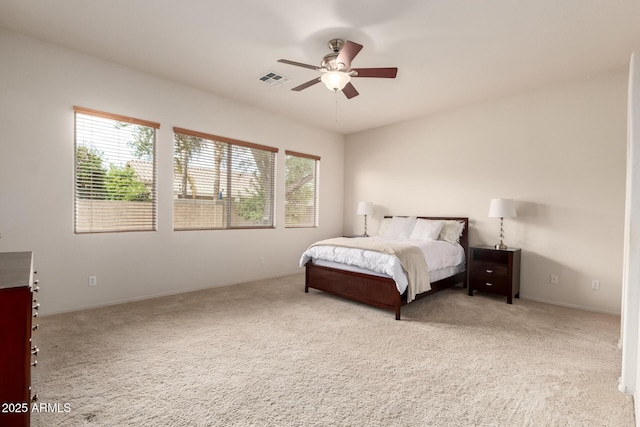 2600 E Hazeltine Way, Chandler, AZ 85249 - bedroom featuring multiple windows, visible vents, ceiling fan, and carpet flooring