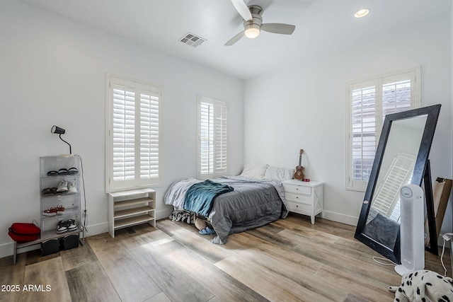 22709 S 202nd St, Queen Creek, AZ 85142 - bedroom with wood finished floors, baseboards, and ceiling fan