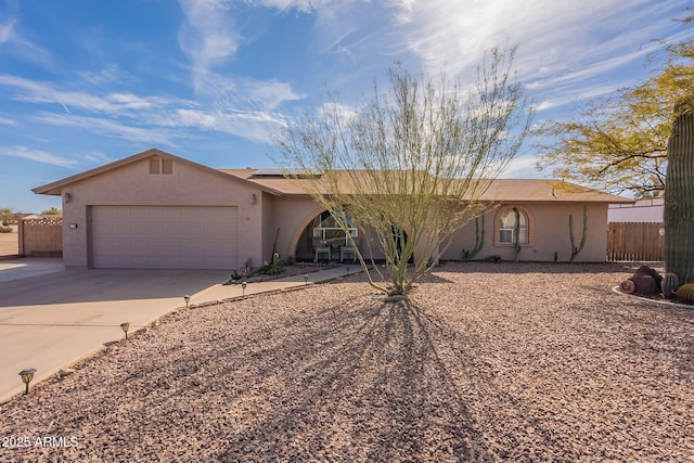 ranch-style house featuring a garage