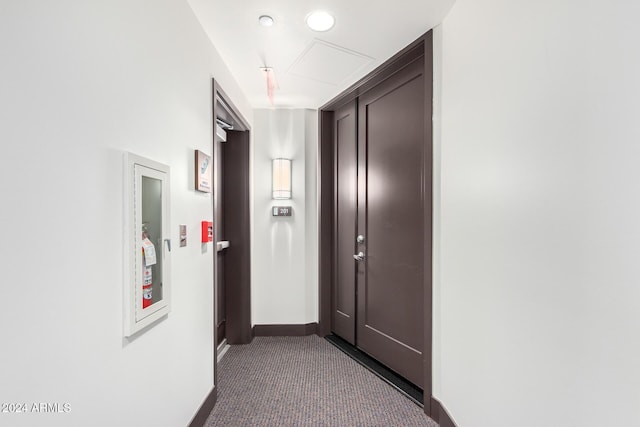 120 E Rio Salado Pkwy Unit 201, Tempe, AZ 85281 - corridor with baseboards and dark carpet