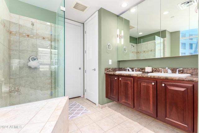 120 E Rio Salado Pkwy Unit 201, Tempe, AZ 85281 - full bath with a shower stall, double vanity, tile patterned floors, recessed lighting, and baseboards