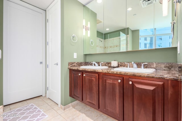 120 E Rio Salado Pkwy Unit 201, Tempe, AZ 85281 - bathroom with double vanity, tile patterned floors, and a tile shower