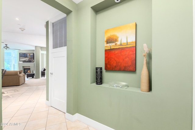 hall with light tile patterned flooring