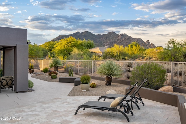 view of patio / terrace with a mountain view