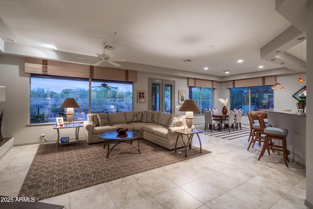 living room with ceiling fan