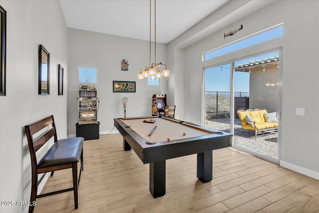 game room featuring light wood-type flooring, baseboards, and billiards