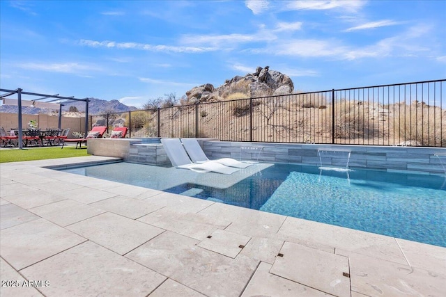 view of swimming pool featuring a patio area, a fenced in pool, and fence