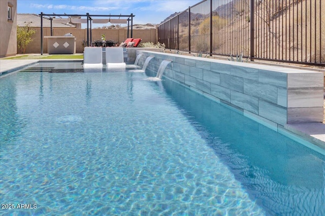 view of pool featuring a fenced in pool and a fenced backyard