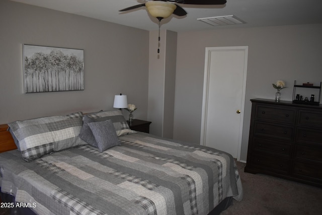 bedroom featuring visible vents, a ceiling fan, and carpet floors