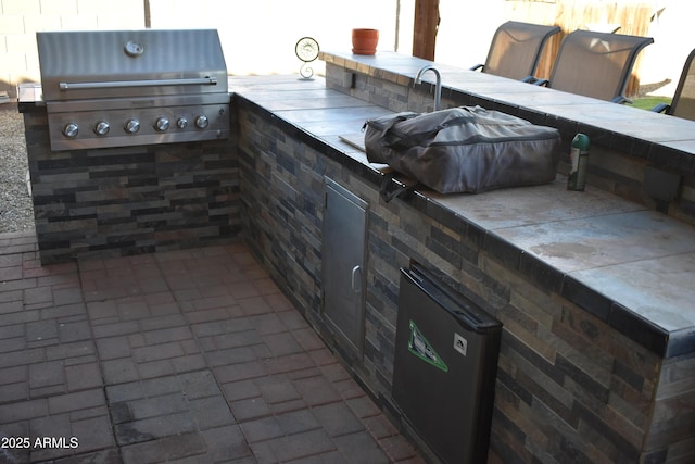 view of patio featuring grilling area and area for grilling