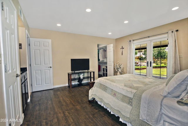 bedroom with dark hardwood / wood-style floors, access to outside, and french doors