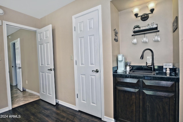 bathroom with hardwood / wood-style floors and vanity